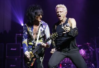 Steve Stevens (left) and Billy Idol perform at New York City's Beacon Theater May 23, 2005.