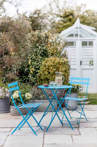 blue bistro set on patio ideas from Garden Trading