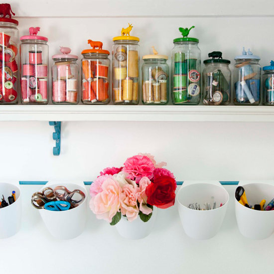 craft room with white wall and shelves