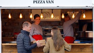 Prince William and Kate Middleton visiting a pizza food truck