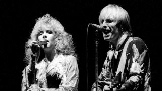 Tom Petty and Stevie Nicks performing onstage in 1981