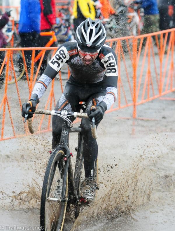 Brandon Dwight (Boulder Cycle Sport)rides with neoprene gloves due to the 32 degree rain