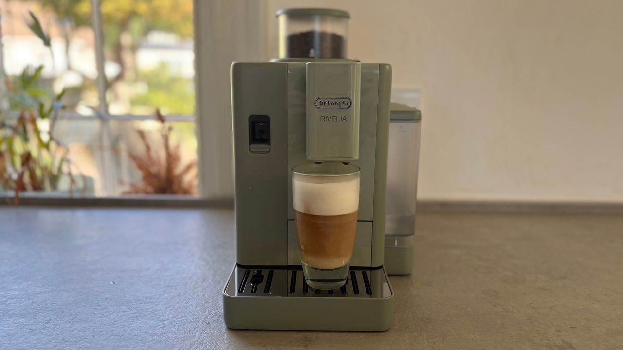 De'Longhi Rivelia Start Coffee Machine on the counter making a macchiato