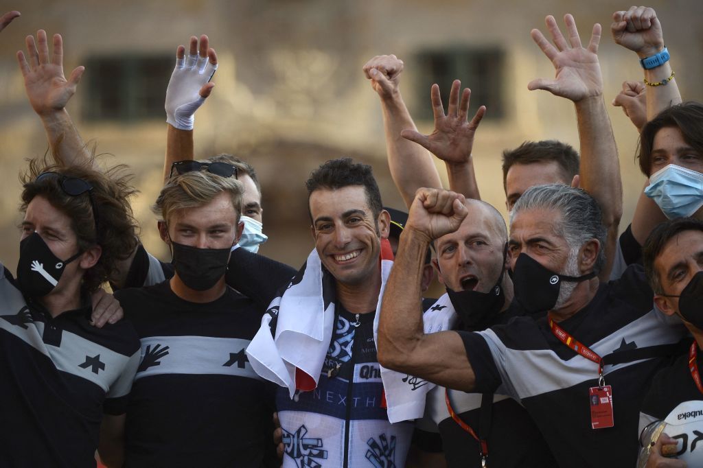 Team Qhubeka Nexthashs Italian rider Fabio Aru C waves after riding the 21st and final stage of the 2021 La Vuelta cycling tour of Spain a 338 km timetrial race from Padron to Santiago de Compostela on September 5 2021 Photo by MIGUEL RIOPA AFP Photo by MIGUEL RIOPAAFP via Getty Images