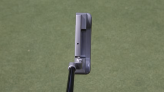A shot of Collin Morikawa's Logan Olson prototype putter from above