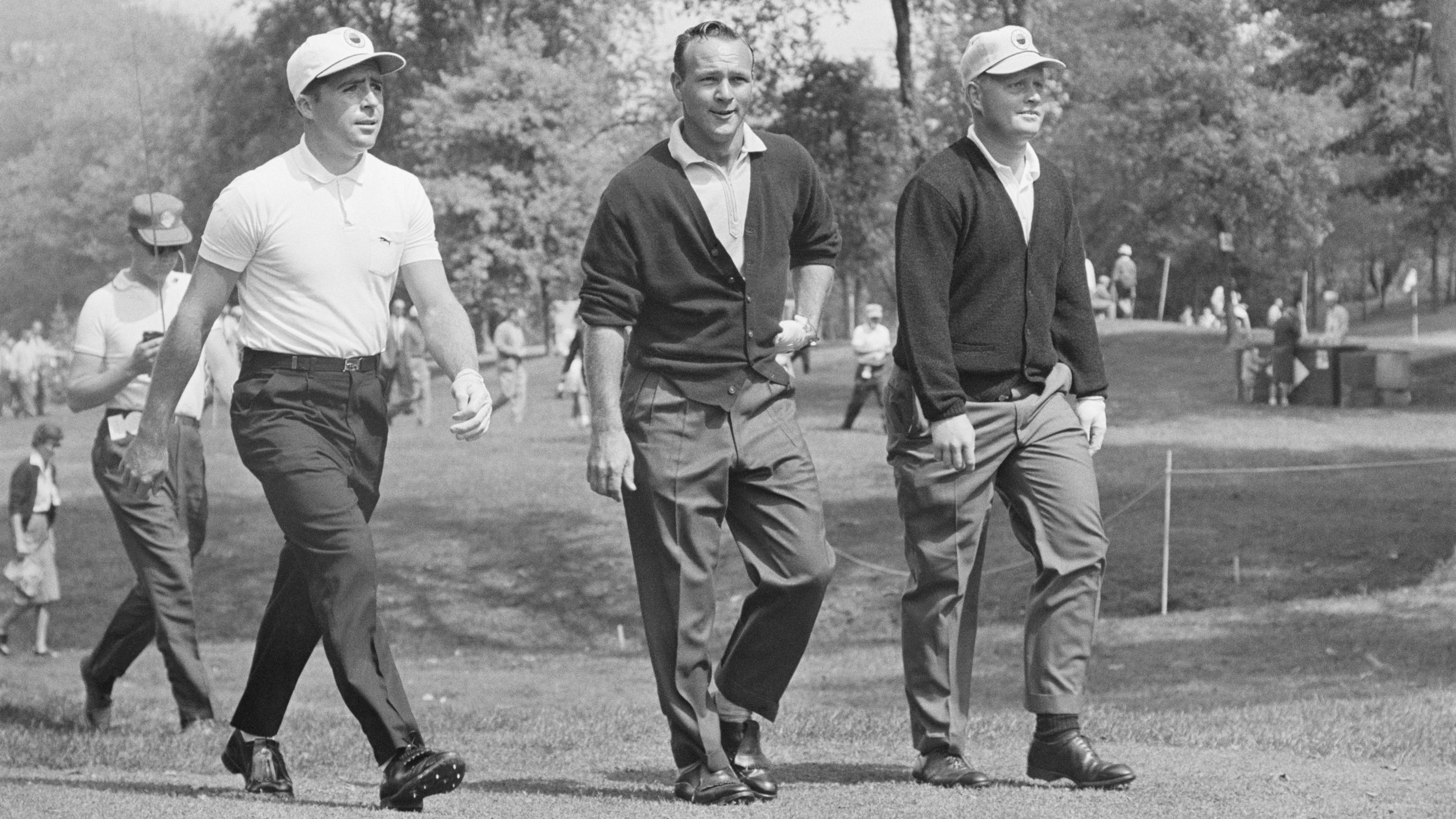 Gary Player, Arnold Palmer and Jack Nicklaus walking from the tee