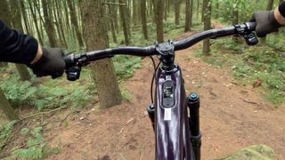 POV shot of an e-MTB on a trail