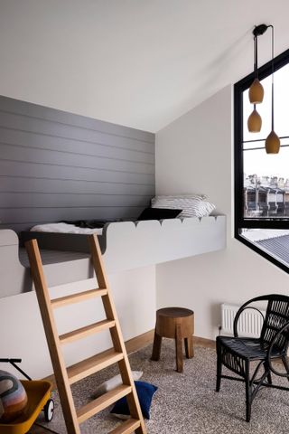 grey loft bed in Upstairs bedroom, Nido II, Melbourne house by Angelucci Architects that is an urban nest