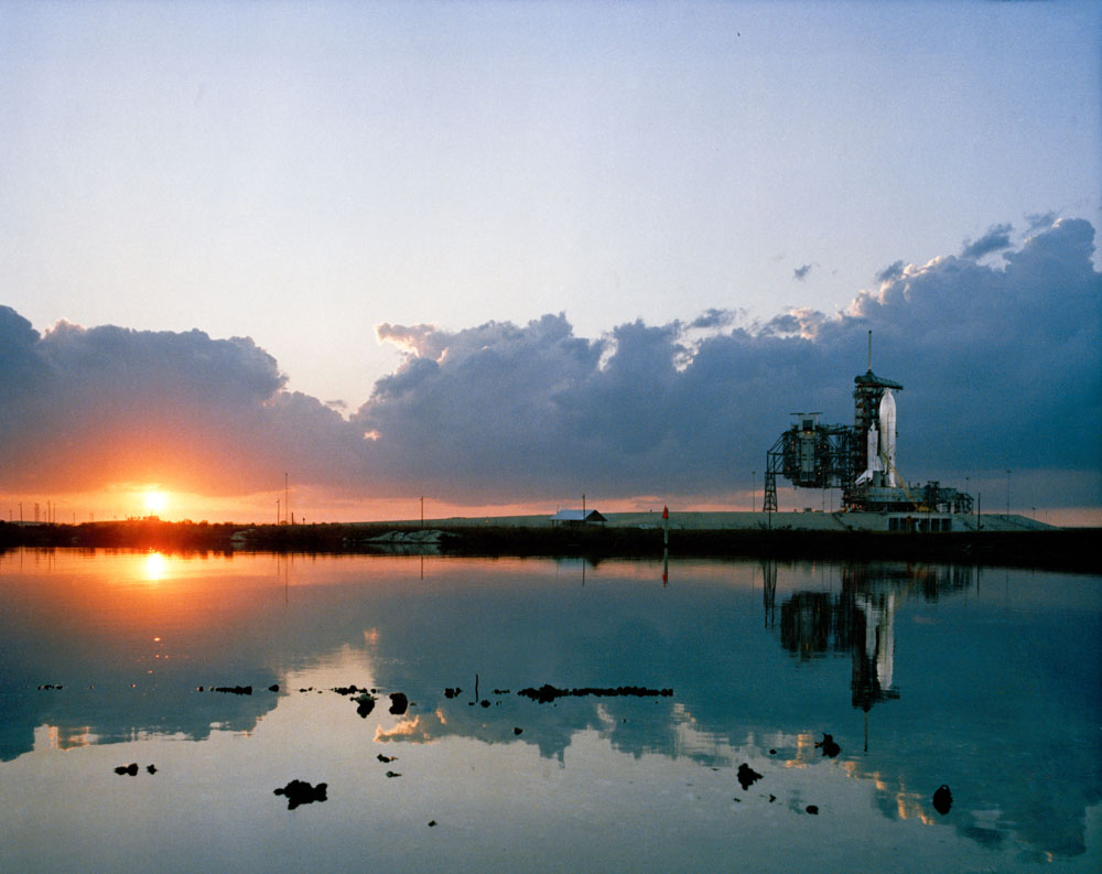 An early morning scene at the Kennedy Space Center&#039;s Launch Complex 39, with the space shuttle Columbia in position on Pad 39A at right in March 1981. The shuttle launched into space on April 12, 1981.