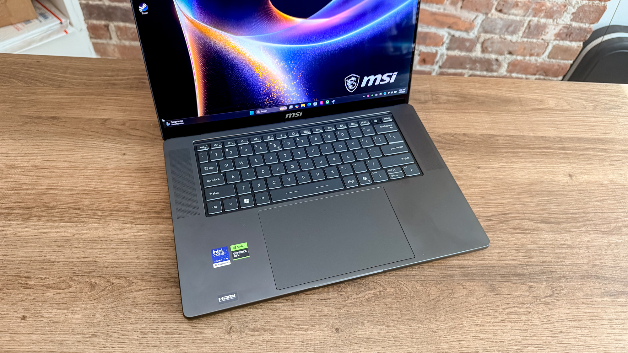An overhead shot showing the MSI Stealth 16 AI+ (2026)'s keyboard