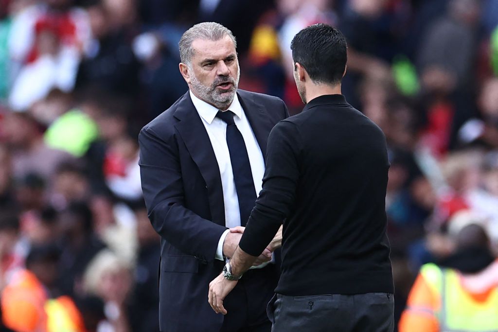 Tottenham Hotspur&#039;s Greek-Australian Head Coach Ange Postecoglou (L) shakes hands with Arsenal&#039;s Spanish manager Mikel Arteta (R) after the English Premier League football match between Arsenal and Tottenham Hotspur at the Emirates Stadium in London on September 24, 2023. The game finished 2-2. (Photo by HENRY NICHOLLS / AFP) / RESTRICTED TO EDITORIAL USE. No use with unauthorized audio, video, data, fixture lists, club/league logos or &#039;live&#039; services. Online in-match use limited to 120 images. An additional 40 images may be used in extra time. No video emulation. Social media in-match use limited to 120 images. An additional 40 images may be used in extra time. No use in betting publications, games or single club/league/player publications. / (Photo by HENRY NICHOLLS/AFP via Getty Images)