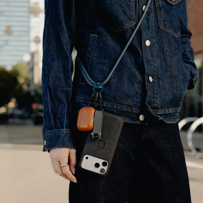 The Peak Design Mobile Crossbody Multi-strap being worn