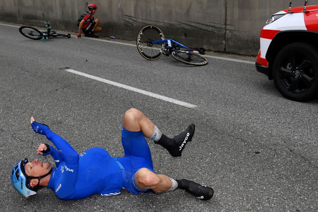 VIAREGGIO ITALY MAY 16 Lukas Pstlberger of Austria and Team Jayco AlUla after being involved in a crash during the 106th Giro dItalia 2023 Stage 10 a 196km stage from Scandiano to Viareggio UCIWT on May 16 2023 in Viareggio Italy Photo by Tim de WaeleGetty Images