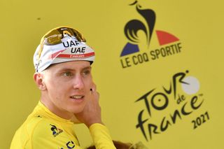 Team UAE Emirates Tadej Pogacar of Slovenia celebrates his overall leader yellow jersey on the podium at the end of the 15th stage of the 108th edition of the Tour de France cycling race 191 km between Ceret and AndorreLaVieille on July 11 2021 Photo by Philippe LOPEZ AFP Photo by PHILIPPE LOPEZAFP via Getty Images