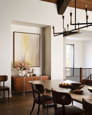 brown dining room with gold art