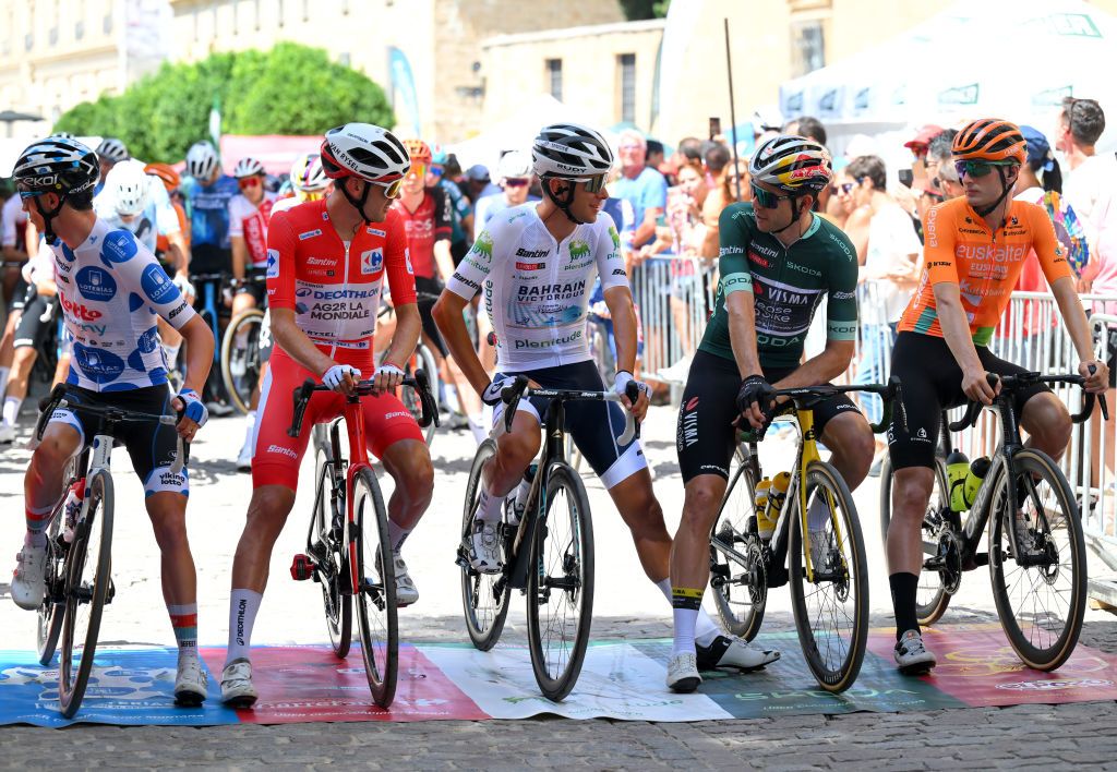 CAZORLA SPAIN AUGUST 24 LR Sylvain Moniquet of Belgium and Team Lotto Dstny Polka Dot Mountain Jersey Ben OConnor of Australia and Team Decathlon AG2R La Mondiale Red Leader Jersey Antonio Tiberi of Italy and Team Bahrain Victorious White Best Young Rider Jersey and Wout van Aert of Belgium and Team Visma Lease a Bike Green Points Jersey prior to the La Vuelta 79th Tour of Spain 2024 Stage 8 a159km stage from Ubeda to Cazorla 1056m UCIWT on August 24 2024 in Ubeda Spain Photo by Tim de WaeleGetty Images