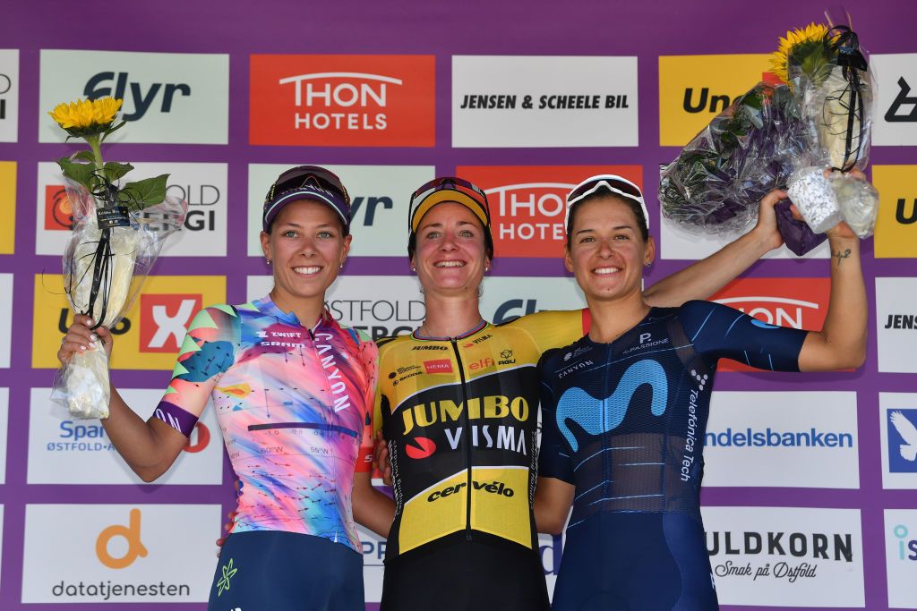 HALDEN NORWAY AUGUST 14 LR Shari Bossuyt of Belgium and Team CanyonSRAM Racing on second place stage winner Marianne Vos of Netherlands and Jumbo Visma Team and Barbara Guarischi of Italy and Movistar Team on third place pose on the podium ceremony after the 8th Tour of Scandinavia 2022 Battle Of The North Stage 6 a 1543km stage from Lillestrm to Halden UCIWWT tourofscandinavia TOSC22 on August 14 2022 in Halden Norway Photo by Luc ClaessenGetty Images
