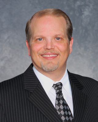 Smiling headshot of Todd Miller.