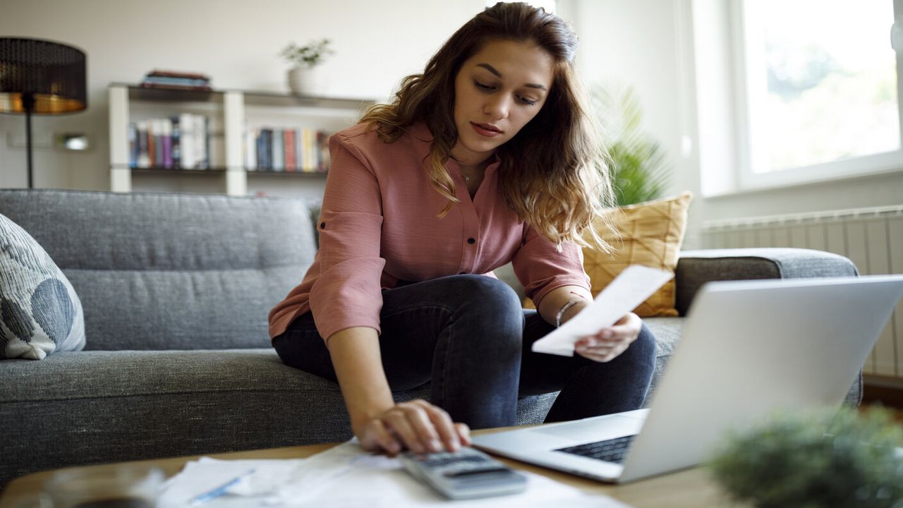 woman looking at paperwork