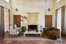 Two wooden doors in a living room