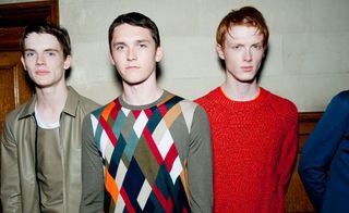 Three male models looking into the camera