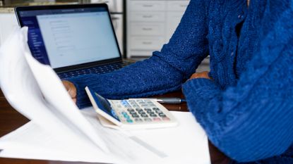 woman doing her taxes