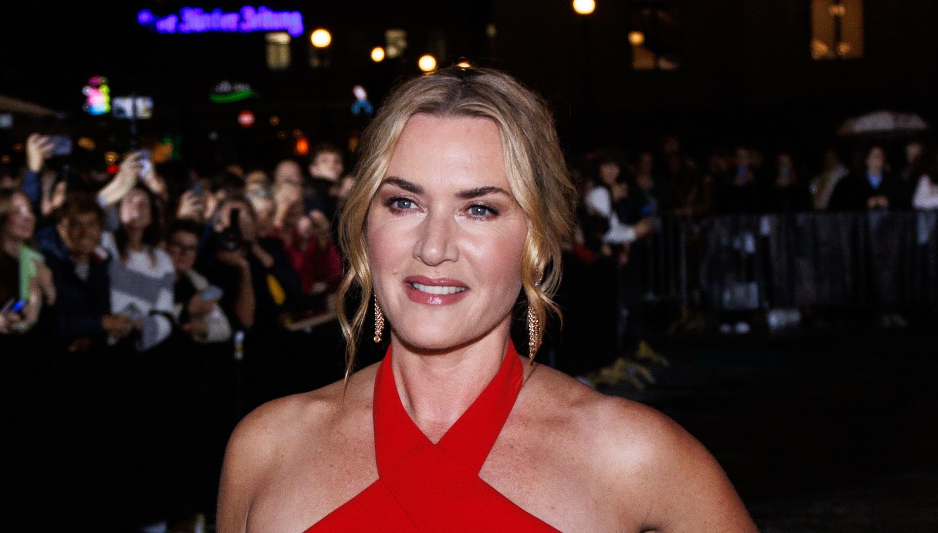 Kate Winslet's vibrant red jumpsuit offers the perfect style