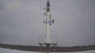 The first Stardust low-altitude rocket by bluShift aerospace stands atop its launch rail on a decommissioned runway in Limestone, Maine for a planned Jan. 15, 2021 launch.
