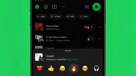A smartphone showing Spotify's new Track Reactions