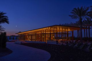 Caymus Suisun Winery tasting building at night, designed by architects BCJ
