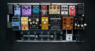 Gem Archer's pedalboard is packed with everything a pro guitarist would need, from a GigRig switcher to a Klon clone, right down to the most important pedal on the board, a guitar tuner