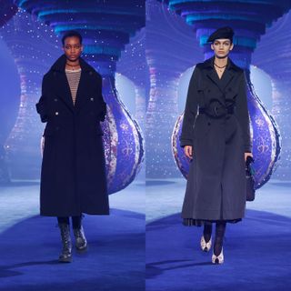 Two models walk the Dior AW23 Paris runway