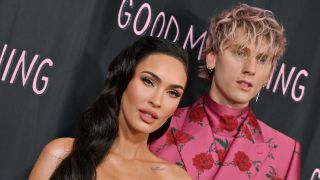 Megan Fox and Machine Gun Kelly posing on the red carpet of Good Mourning in 2022