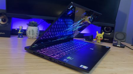 Acer Predator Helios Neo 16S AI gaming laptop on a wooden desk