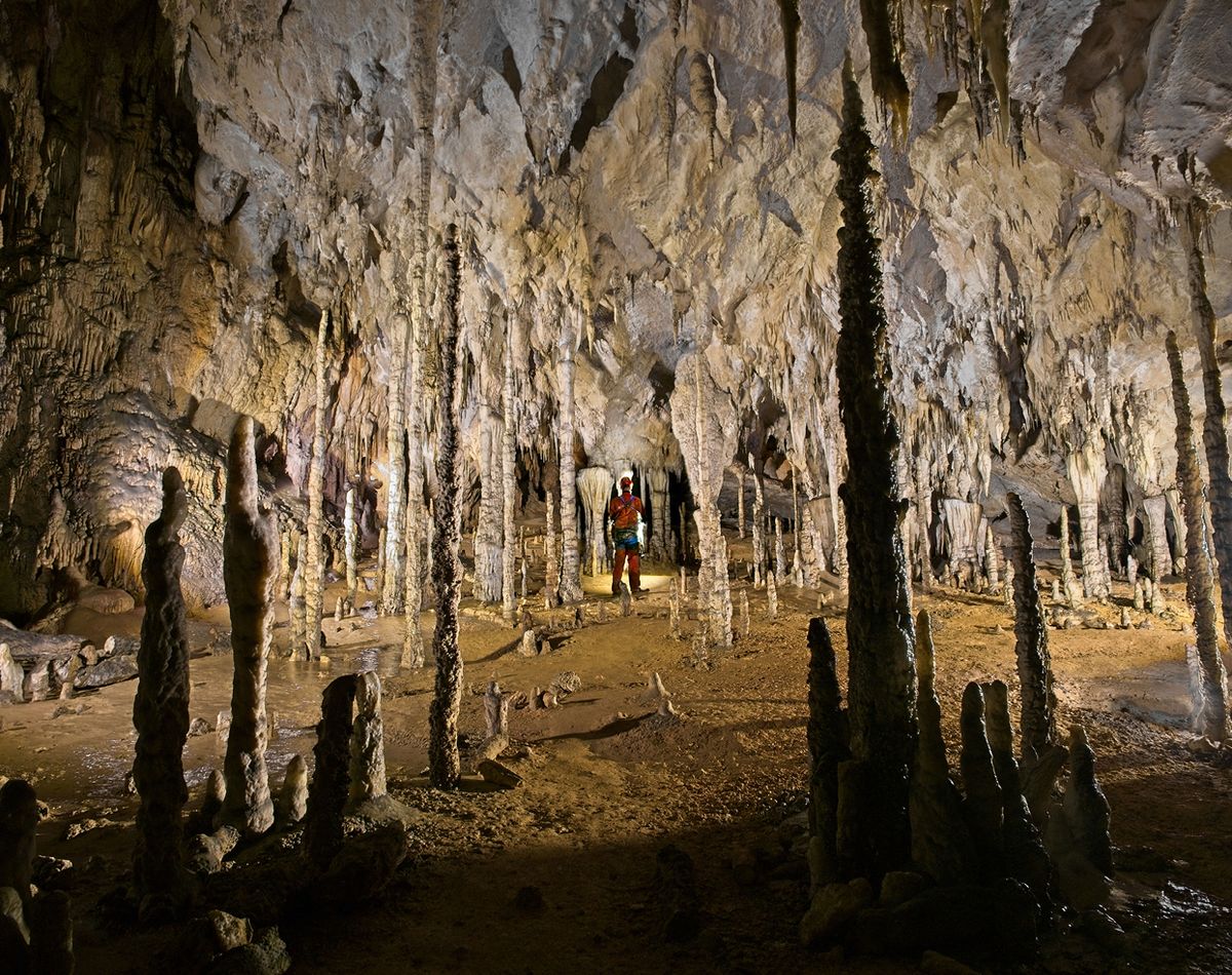 Andrew Northall at Sala de los Fantasmas (Room of the Ghosts), Coventosa Cave, Cantabria, Spain. Photographed by Sam Davis