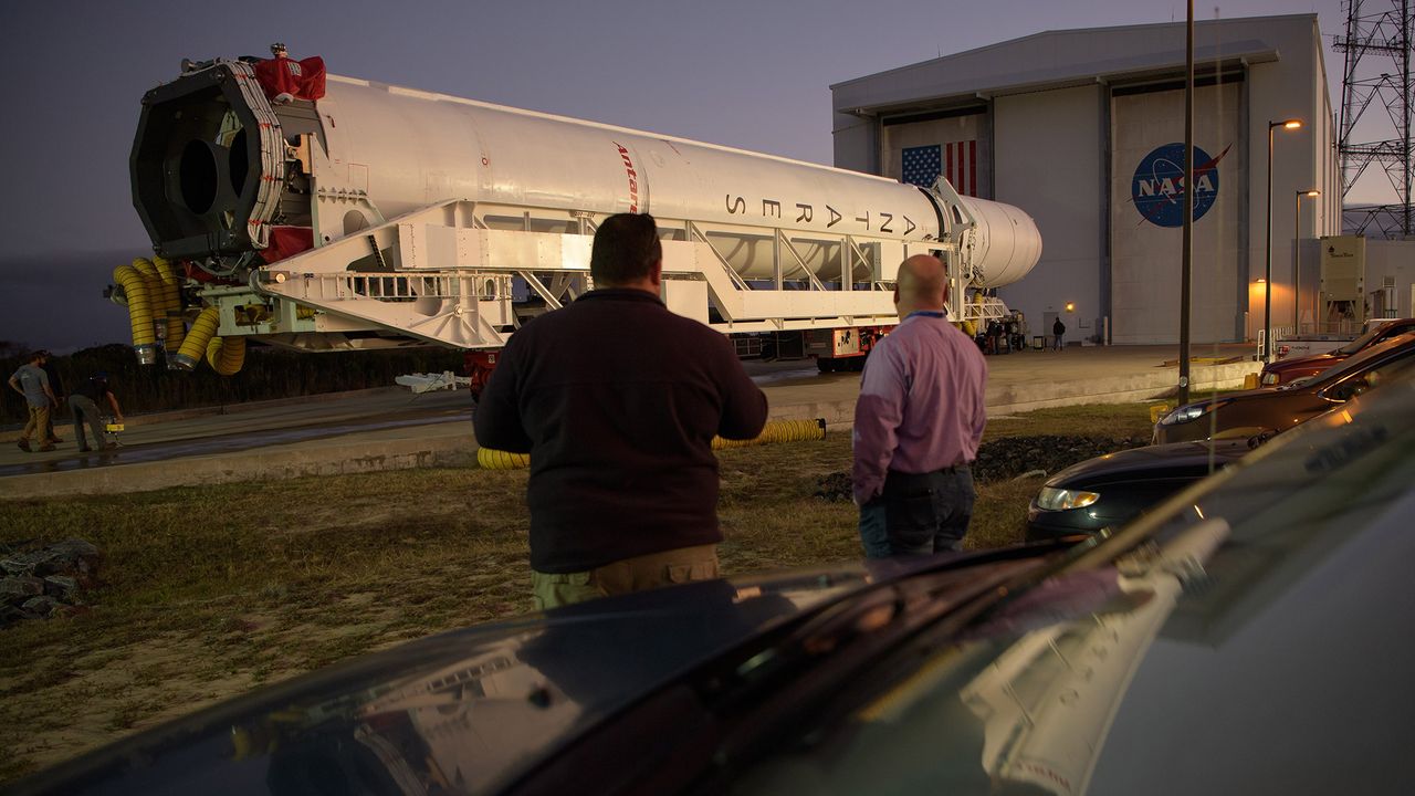 A Northrop Grumman Antares rocket is seen as it is rolled out of the Horizontal Integration Facility to launch Pad-0A, Tuesday, Oct. 29, 2019, at NASA's Wallops Flight Facility in Virginia.