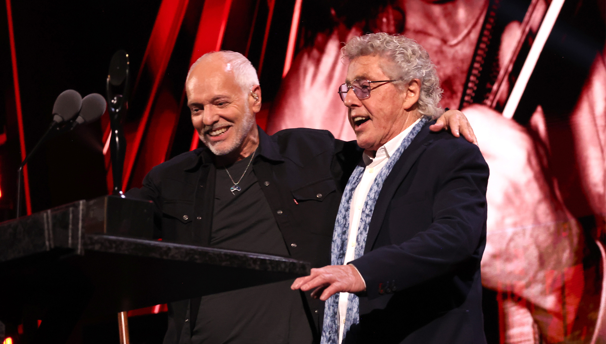 Peter Frampton and Roger Daltrey speak onstage at Frampton's 2024 Rock &amp;amp; Roll Hall Of Fame Induction Ceremony, October 19, 2024 in Cleveland, Ohio.