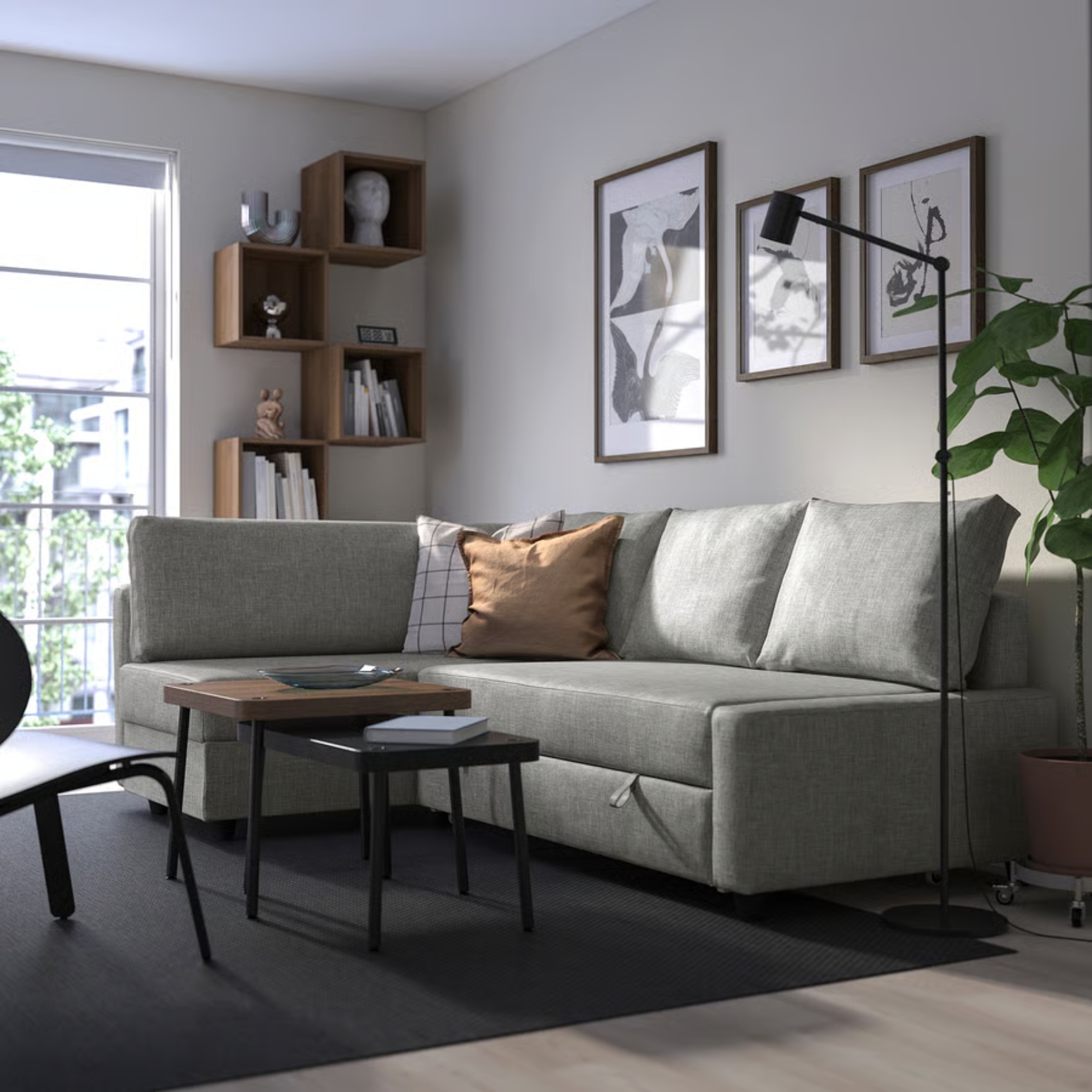 ikea sofa bed with a cushioned back in living room