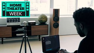 listerer using Dirac Live to EQ speakers