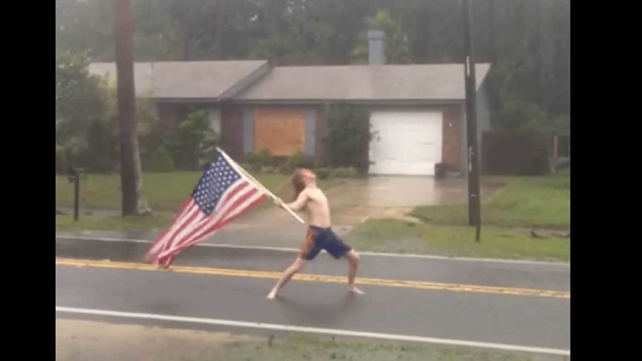 Florida metal fan Lane Pittman headbangs to Slayer in the middle of Hurricane Matthew