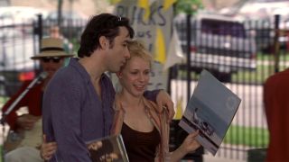 John Cusack as Rob Gordon with Laura in High Fidelity