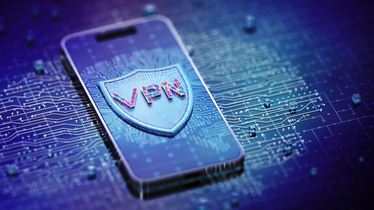 A concept image of a phone against a bright blue circuit board with &#039;VPN&#039; in a shield on the phone&#039;s screen