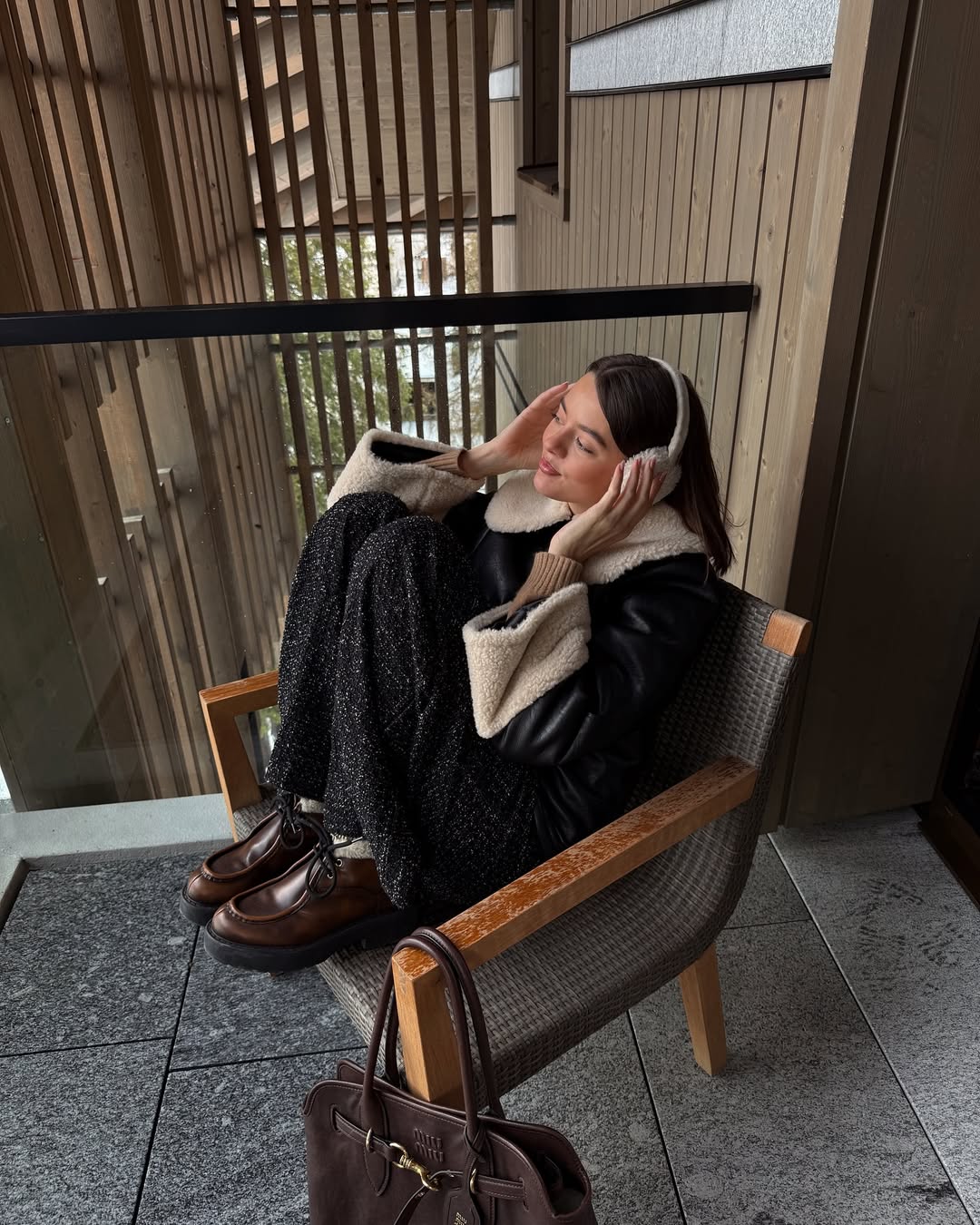 Mary L. Jean poses with a glossy, coiffed bob and flushed cheeks