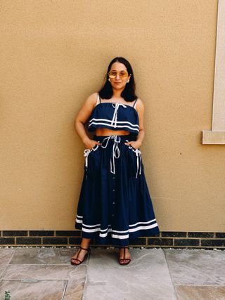 Who What Wear's Editor in Chief, Hannah Almassi wears a Free People top and skirt set