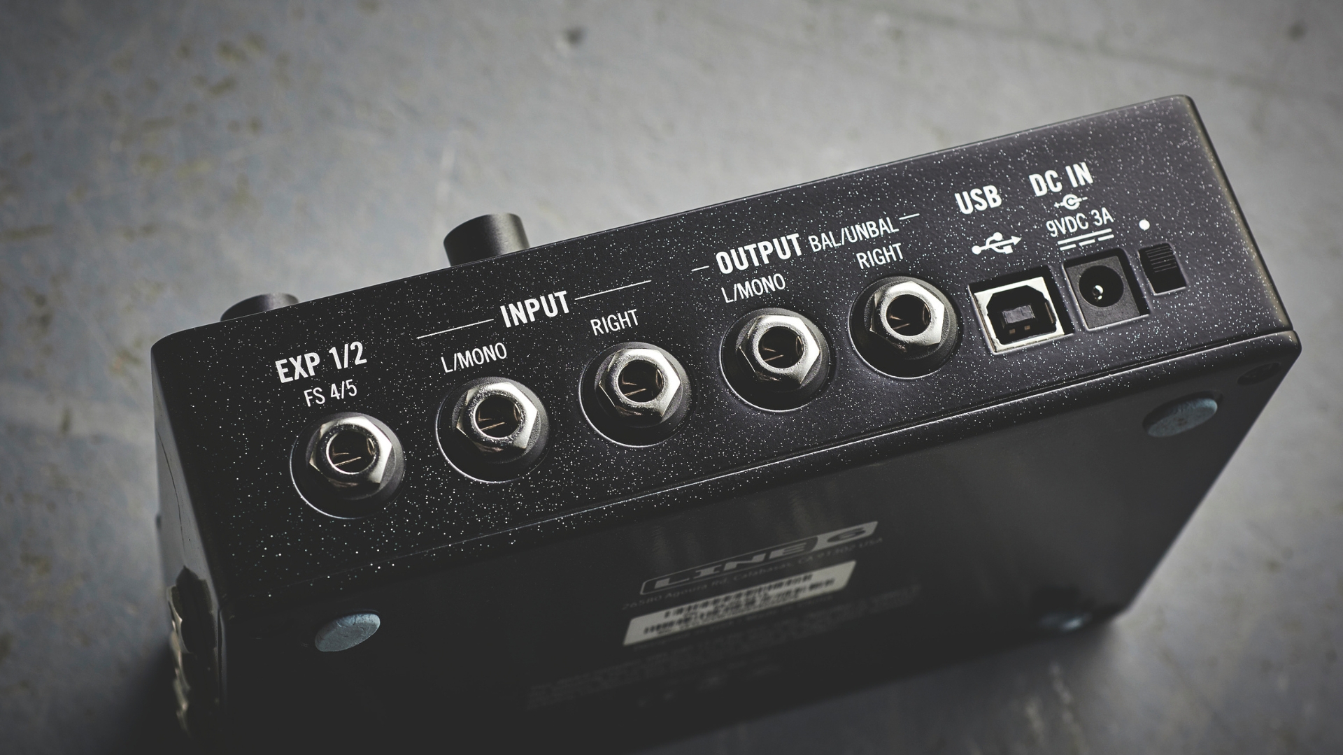 The connections panel of a Line 6 HX Stomp pedal amp