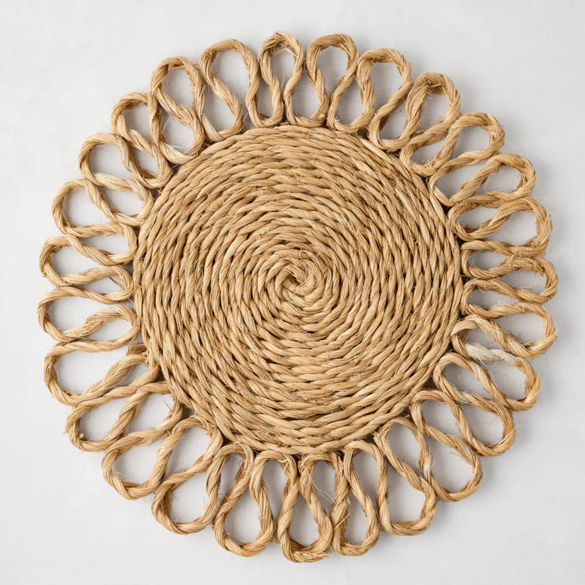 Abaca woven placemat in the shape of a flower