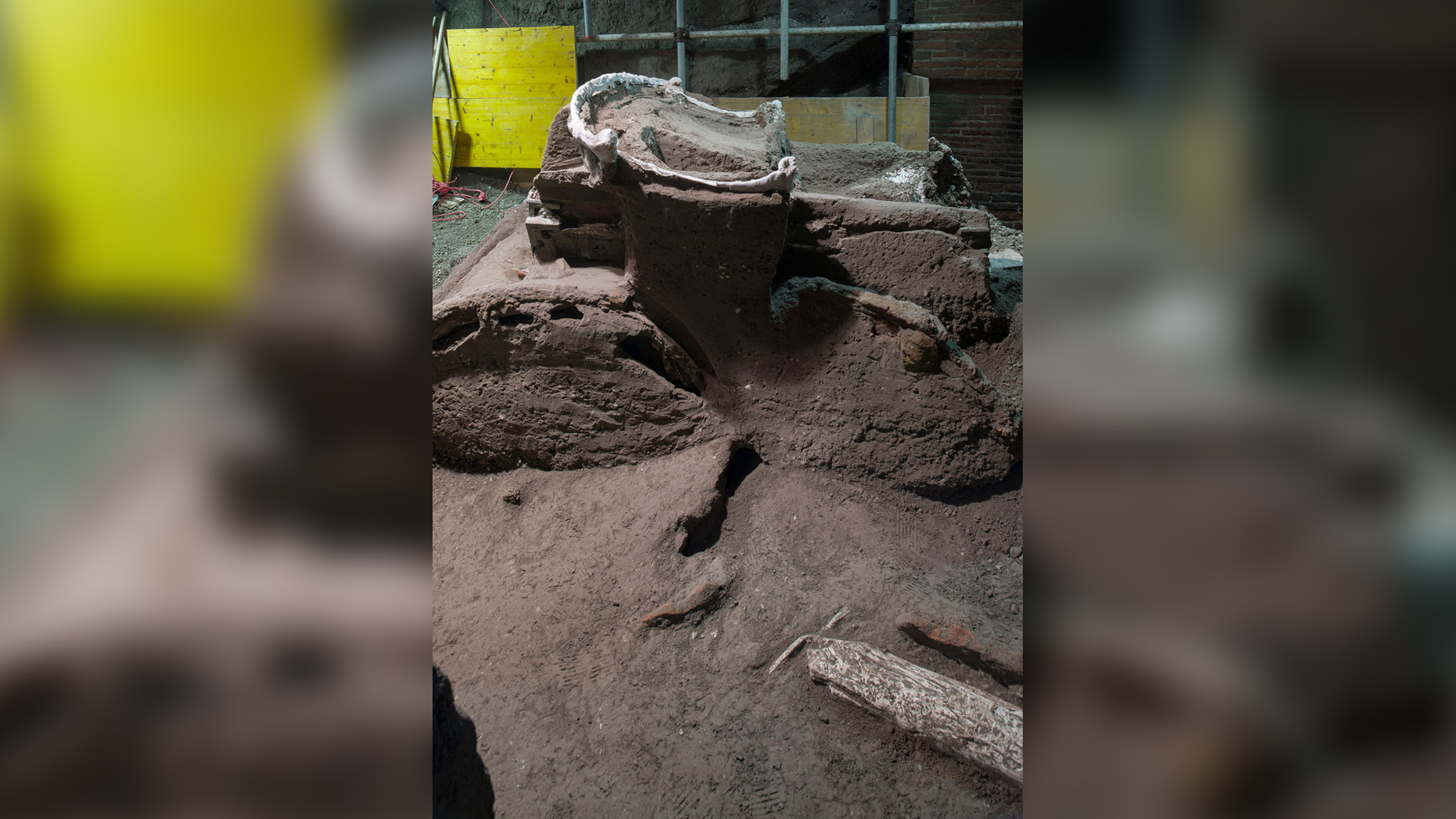The horse-drawn ceremonial chariot had four wheels and was made from iron, bronze and wood. Imprints remain of its ropes and floral decorations.