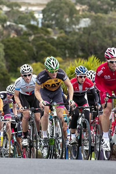 Tour leader Gordon McCauley (centre) of the Hyster-Total Rush team back in the peloton on stage seven.