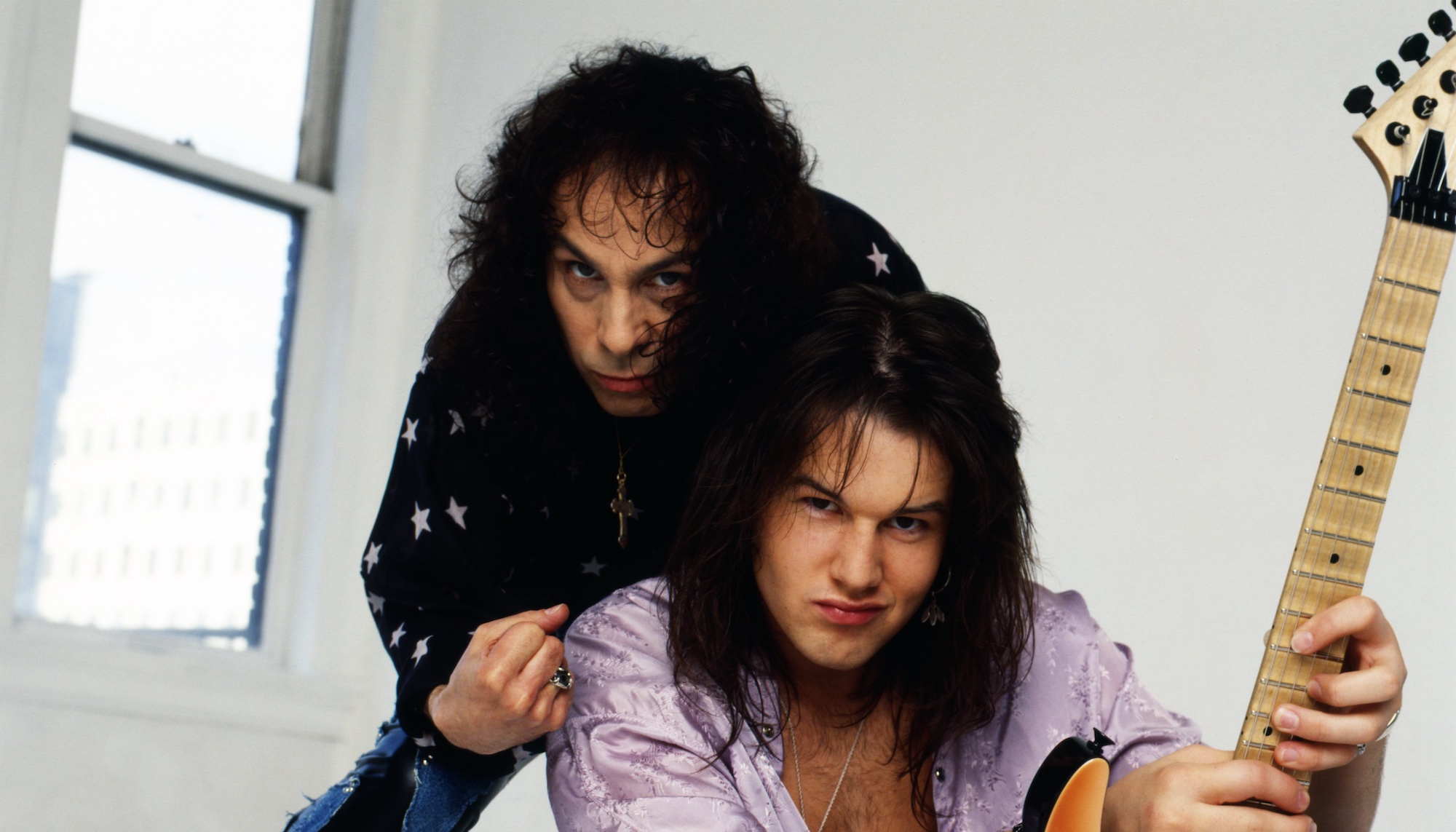 Ronnie James Dio (left) and Rowan Robertson, posing for a photo on April 10, 1990