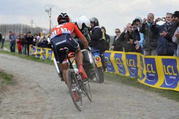 Fabian Cancellara (Saxo Bank) rides away from the others.